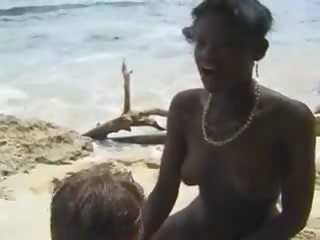 Hairy African lassie fuck Euro Ms in the Beach